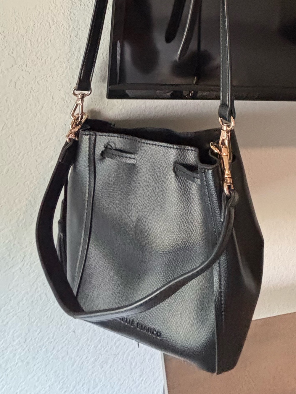 Melie Bianco Black Leather Bucket Shoulder Bag with Gold Hardware